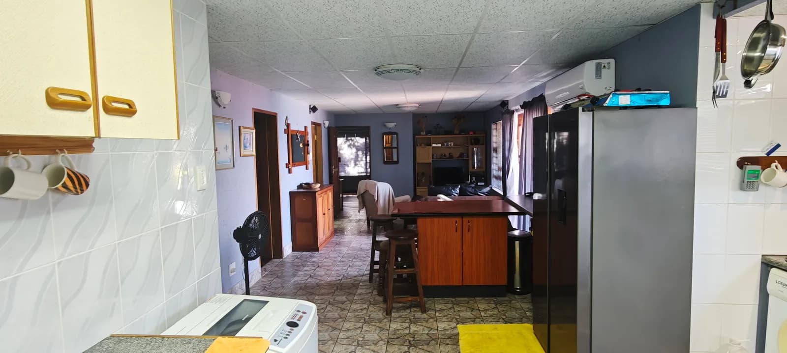 Looking through the kitchen to the dining area
